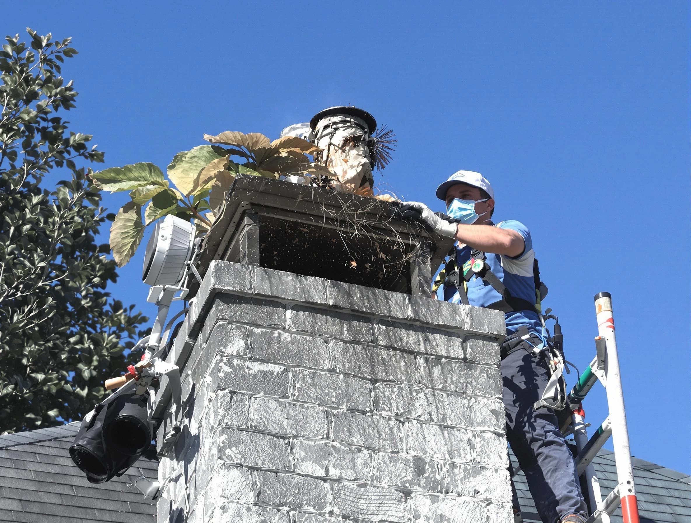 Hillsborough Chimney Sweep specialist performing chimney cleaning in Hillsborough, NJ